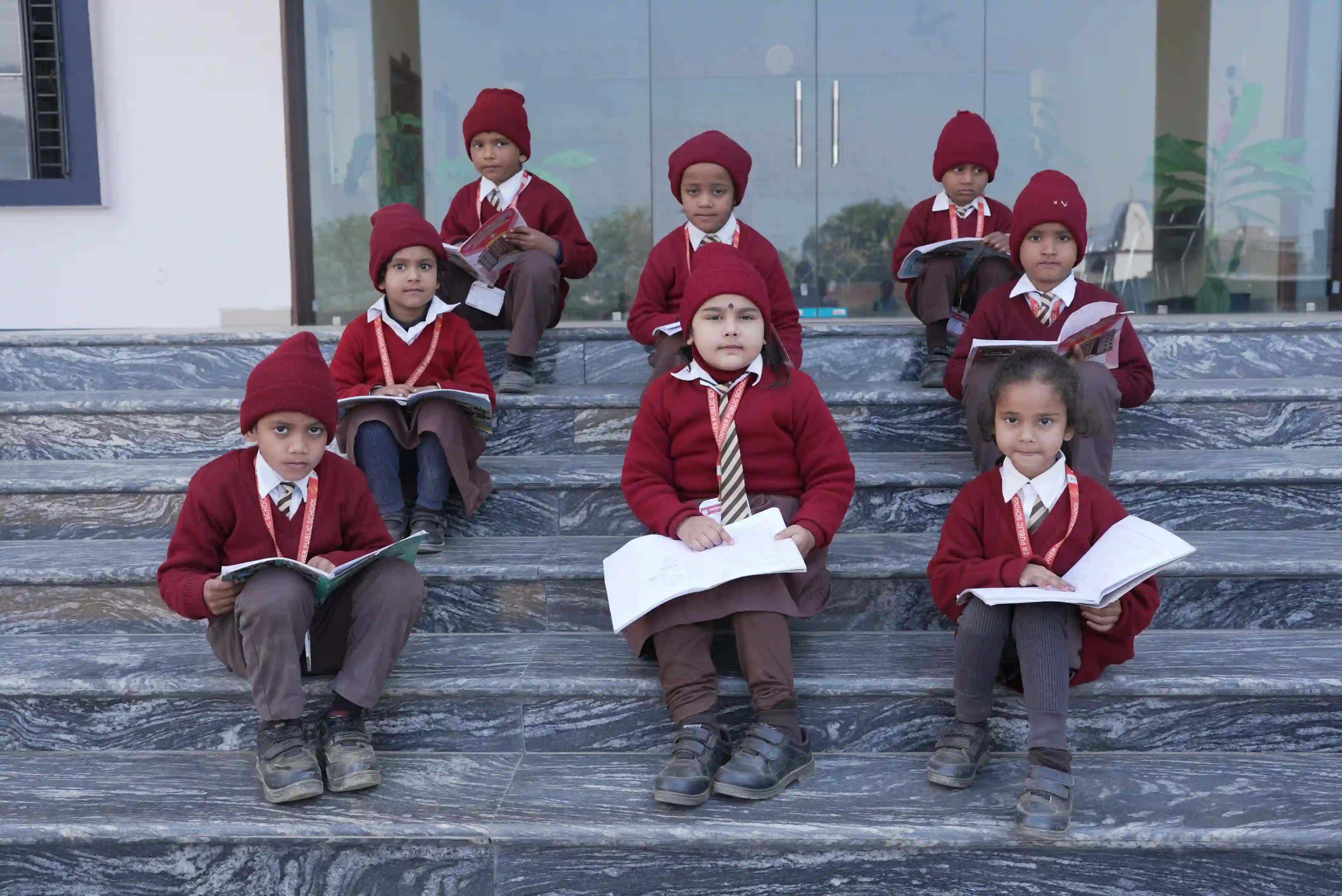 Children sitting on steps
